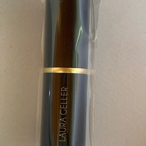 Laura Geller Black and Gold Lipstick Tube
